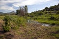 The river goes through the orchard. Photos