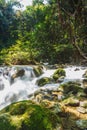 A river headwaters flows over rocks Royalty Free Stock Photo