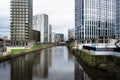 River Irwell running through the center of Manchester UK modern office and apartment building. Royalty Free Stock Photo