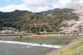 river (katsura-gawa) and bridge in arashiyama in kyoto (japan)
