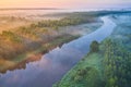 River landscape aerial view. Riverside view from above. Summer nature in sun rays. Drone view on sunny nature with curved river. Royalty Free Stock Photo