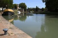 Barge moored on the bank of the Canal du Midi in Castelnaudary Royalty Free Stock Photo