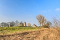 River landscape in the Netherlands in the floodplains of the river maas with Castle Loevestein