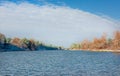 River landscape in winter and tree branches covered with white frost Royalty Free Stock Photo