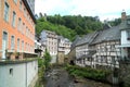 River Laufenbach flows often beneath the houses in Monschau Germany