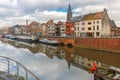 River Leie, colored houses and Belfry tower in