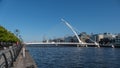 River Liffey and Samuel Beckett Bridge / Harp Bridge in Dublin, Ireland Royalty Free Stock Photo