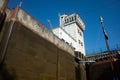 The river lock is filled with water to allow the ship to pass. Royalty Free Stock Photo