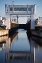 The river lock is filled with water to allow the ship to pass. Royalty Free Stock Photo