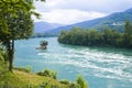 River with a lonely house on a rock on a summer day in mountains Royalty Free Stock Photo