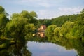 River Luznice,trees and house,Bechyne. Royalty Free Stock Photo