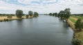 The river Maas in the Netherlands on a calm summer afternoon