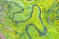 River meanders through national wildlife refuge, early summer aerial view Royalty Free Stock Photo