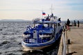 River motor ship OM-357 at the pier of Avtozavodsky district awaits passengers before leaving on the commuter route.