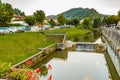 river through mountain village in Tuscany