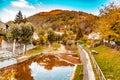 river through mountain village in Tuscany