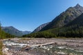 A river in the mountains with a bridge. Royalty Free Stock Photo