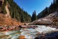 A river in the mountains of Kyrgyzstan in the Semenovsky gorge high mountains Royalty Free Stock Photo