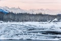 River and Mountains in snow on a sunrise. Royalty Free Stock Photo