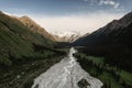 River and mountains with white clouds