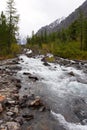 River, mountains and woods.