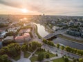River Neris and Vilnius Business District in Background. Lithuania, Sunset Sky.