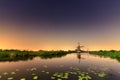 River night windmill Royalty Free Stock Photo