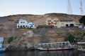 River Nile/ beautiful view for Aswan Egypt and Nubian Egyptian culture. sailing boat sailing in the River Nile and harbor with bir Royalty Free Stock Photo