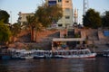 River Nile/ beautiful view for Aswan Egypt and Nubian Egyptian culture. sailing boat sailing in the River Nile and harbor with bir