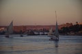 River Nile/ beautiful view for Aswan Egypt and Nubian Egyptian culture. sailing boat sailing in the River Nile and harbor with bir