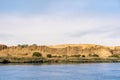 River Nile with it`s river banks full of vegetaion and the Sahara Desert close by