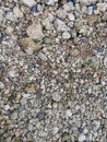 river pebbles mixed with sand Royalty Free Stock Photo