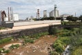 A river polluted with waste from a nearby factory