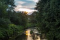 River in the rays of the setting sun Royalty Free Stock Photo