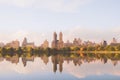 River reflecting modern buildings on a sunny day, Central Park, New York, USA