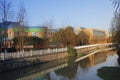 River reflecting resident house and withered willow Royalty Free Stock Photo