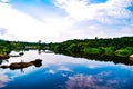 river reflection blue skies Royalty Free Stock Photo