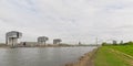 River Rhine, with Kranhaus buildings on one embankment and poller wiesen green city park on the other side, cologne Royalty Free Stock Photo