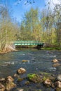 River with a road bridge in a forest in the spring Royalty Free Stock Photo