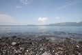 River Rocks, colors stone on Idyllic crystal seawater in front of luxury hotel, attractive clear sea, nature coastline backgrounds Royalty Free Stock Photo