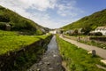 River running through middle of Boscastle harbour village in Boscastle, Cornwall, UK