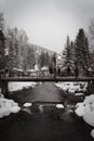 A river running under a snow covered bridge in Vail, Colorado.