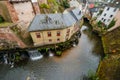 River Saar with waterfall and water mills in the historic town of Saarburg, Germany