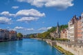 The river Saone view with Church of Saint Georges and footbridge in the city center of Lyon Royalty Free Stock Photo