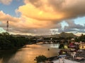 River scene with a bridge at sunset