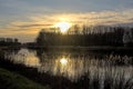 Evening sky ovr river Scheldt in the flemish countryside Royalty Free Stock Photo