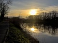 Sunset sky over river Scheldt in the flemish countryside Royalty Free Stock Photo