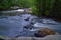 River with small dam time exposure Royalty Free Stock Photo