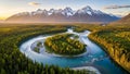 River snaking through a dense forest with snow-capped mountains in the Royalty Free Stock Photo