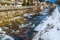 river through snowy alpine village Royalty Free Stock Photo